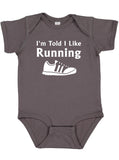 I'm Told I Like Running Silhouette Baby Bodysuit