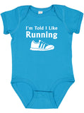 I'm Told I Like Running Silhouette Baby Bodysuit