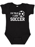 I'm Told I Like Soccer Silhouette Baby Bodysuit