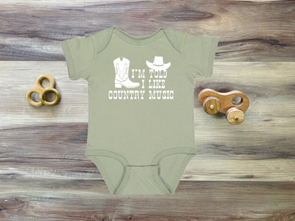 I'm Told I Like Country Music Silhouette Baby Bodysuit