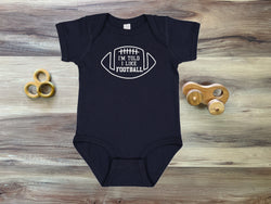 I'm Told I Like Football Silhouette Baby Bodysuit