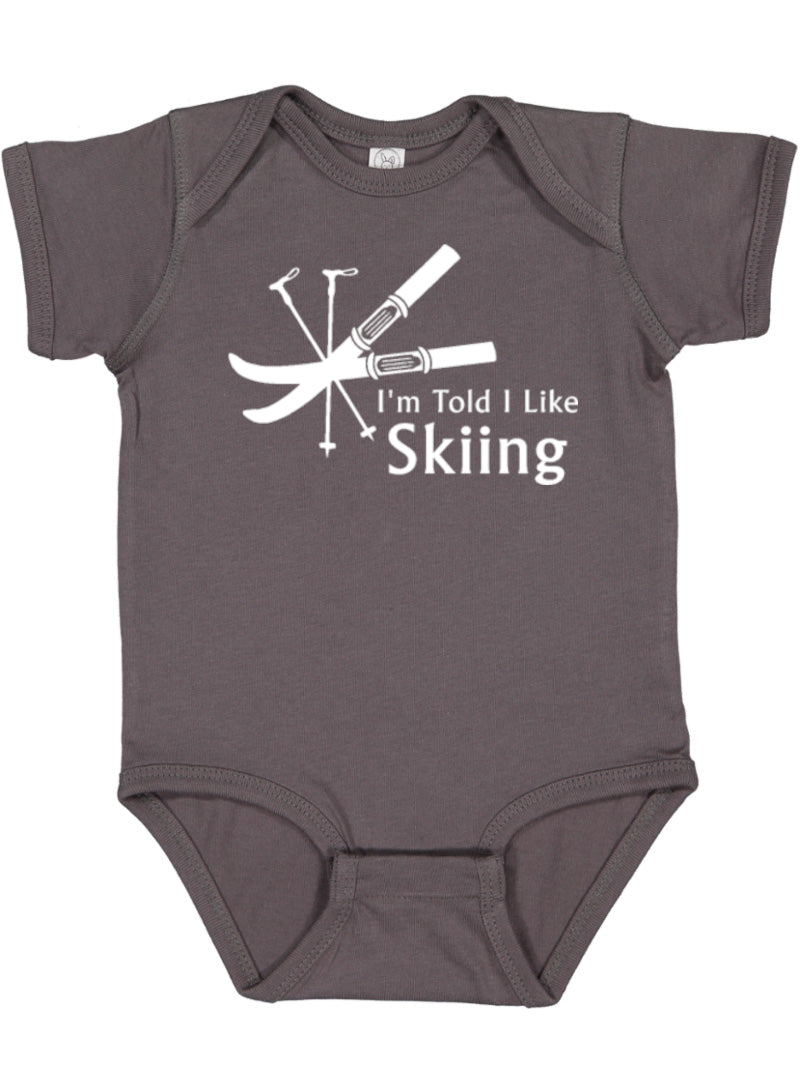 I'm Told I Like Skiing Silhouette Baby Bodysuit