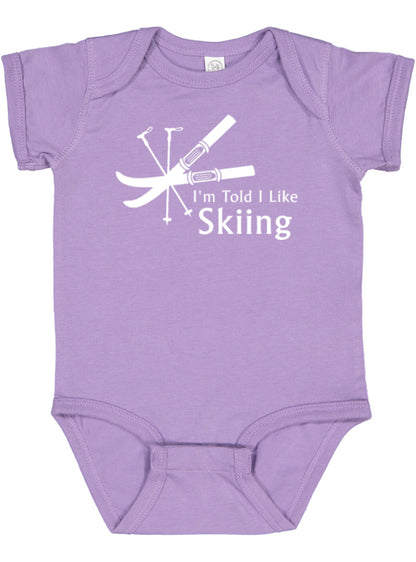 I'm Told I Like Skiing Silhouette Baby Bodysuit