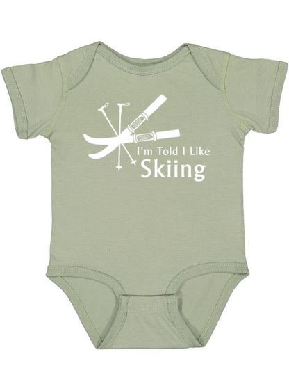 I'm Told I Like Skiing Silhouette Baby Bodysuit