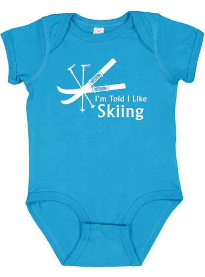 I'm Told I Like Skiing Silhouette Baby Bodysuit