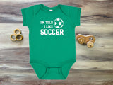 I'm Told I Like Soccer Silhouette Baby Bodysuit