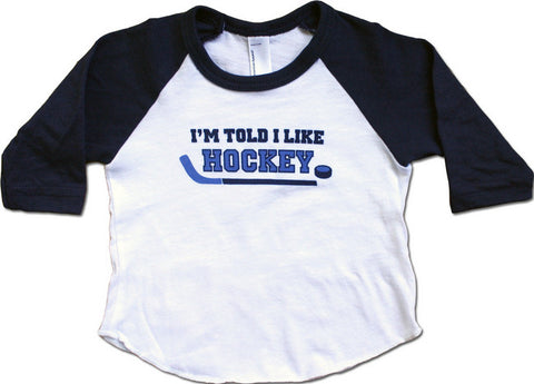 I'm Told I Like Hockey Graphic Baby & Toddler Long Sleeve Shirt